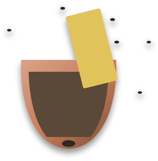 A yellow sticky card pushed into compost at an angle, with small flies stuck to it and flying around it.